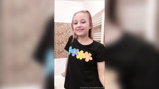 dashenka18 -  Young babe teasing in her clothes in front of the camera