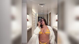 kalani hilliker - Curvy babe in swimsuit poses in front of mirror