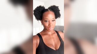 jamelia - A mulatto woman with big tits teases in front of the camera