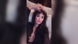 elena ora - Curly-haired brunette teases in her dressing gown in front of the camera