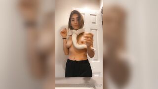 stepgf - Little girl with small tits showing off her snake.