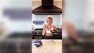 julianne hough  -  Young woman in clothes in the kitchen dancing in front of the camera