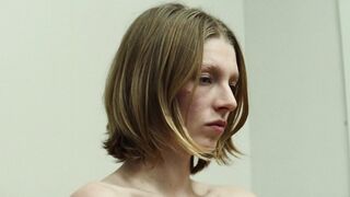 hunter schafer -  A young girl strips naked at a doctor's examination.