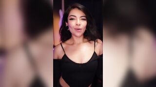 aileen senpai  - A brunette wearing clothes dances in front of the camera